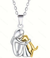 A little girl and a dog embrace earrings