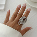 Geometric ripple imitation pearl ring, irregular elliptical alloy winding ring