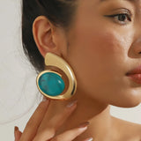 Trendy earrings made of turquoise