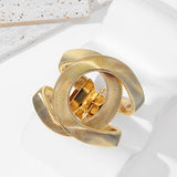 European and American exaggerated spring hollow bracelet, personalized shape, metal elastic opening, adjustable women's hand acc