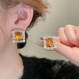 Mirad oval resin pearl geometry 925 silver needle earrings with retro palace style, niche temperament, high-end earrings