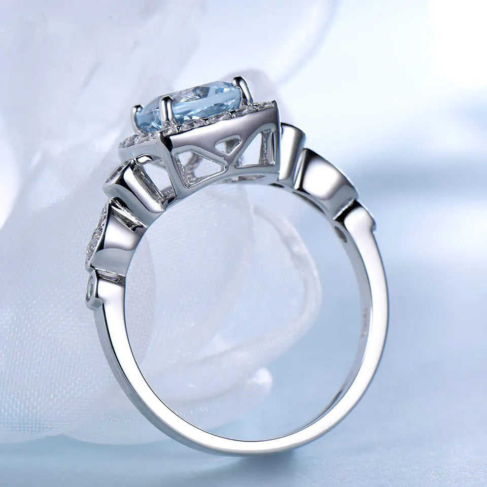 ZDRSHP0002 - S925 Ley Anillo Topacio Artificial y Circonita Cubica Blanca Calenbi Joyería