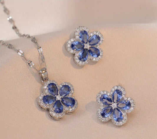 NEB0022 - Collar y Aretes Acero Inoxidable Circonita Cubica Flor Azul Calenbi
