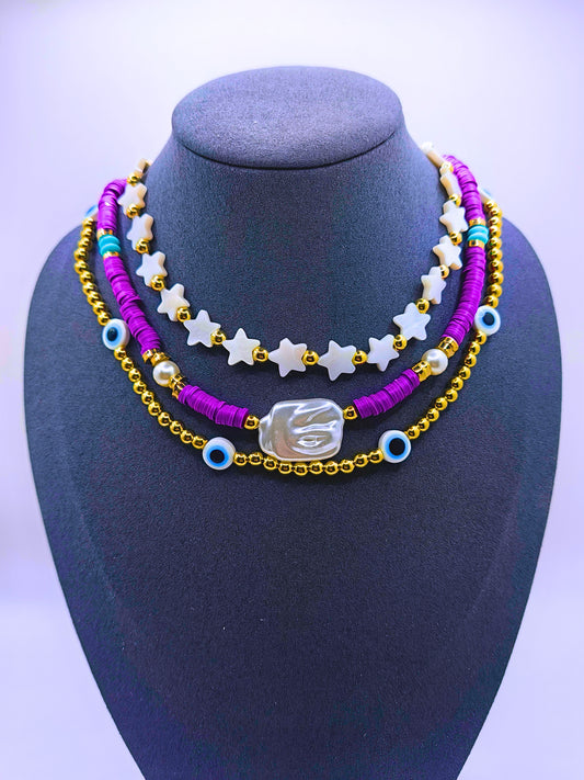 BNv0001 - Collar Plástico Bohemio Triple Morado Ojo Turco Calenbi