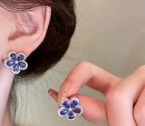 NEB0022 - Collar y Aretes Acero Inoxidable Circonita Cubica Flor Azul Calenbi Calenbi Joyería