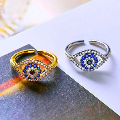 RB0023 - Anillo Acero Inoxidable Circonita Blanco y Azul Chapa Oro 14K Ajustable Calenbi Calenbi Joyería