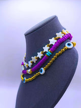 BNv0001 - Collar Plástico Bohemio Triple Morado Ojo Turco Calenbi Calenbi Joyería